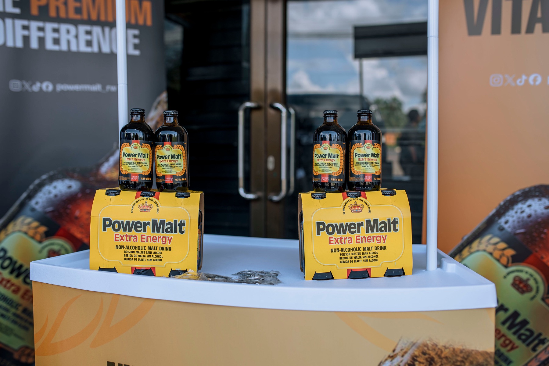 Power Malt multipacks on a branded counter